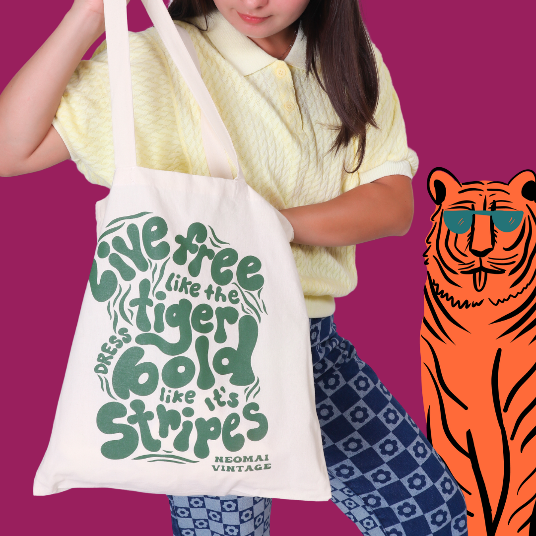 "Live free like the tiger, dress bold like it's stripes" Tote Bag